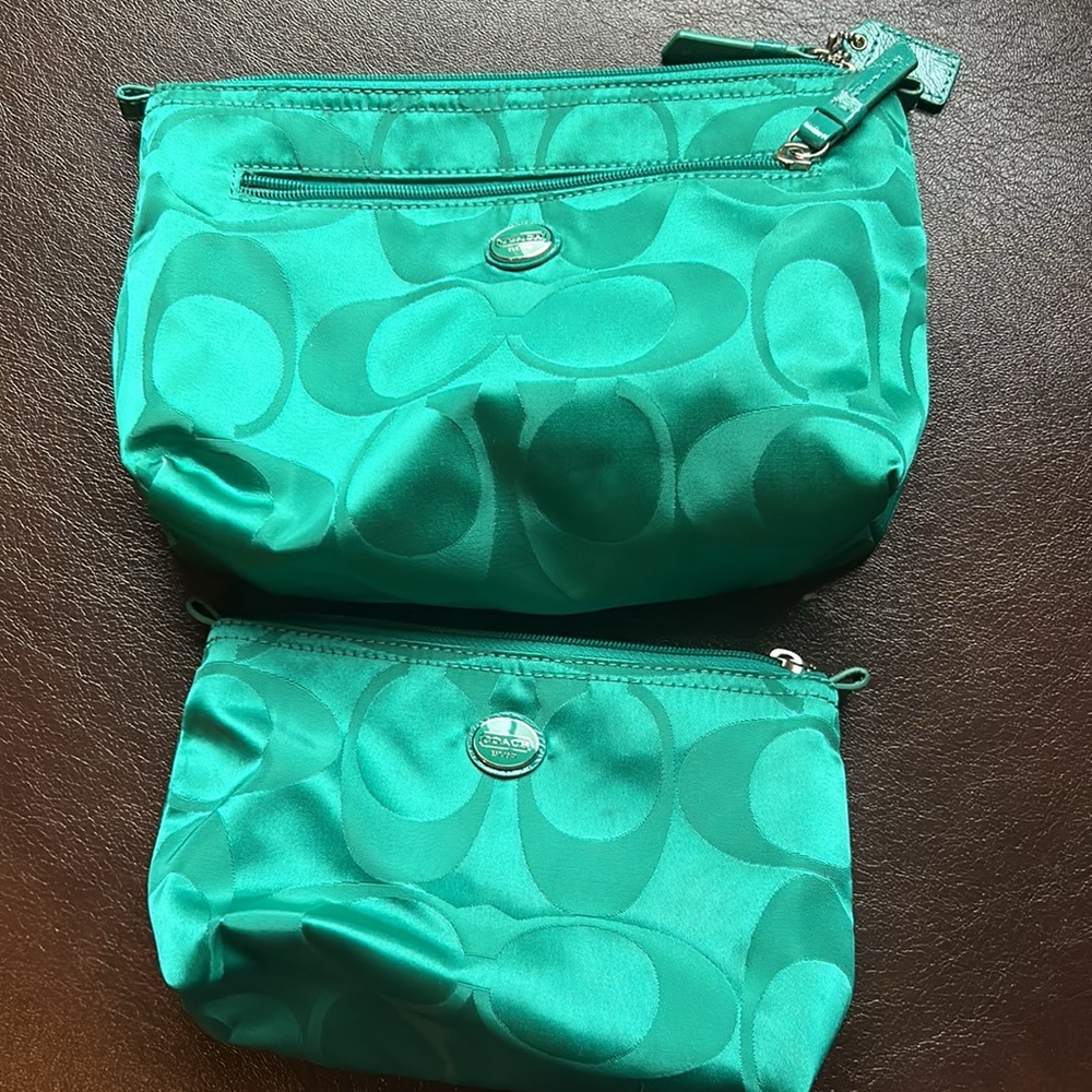 Bright jade Coach cosmetic bag set